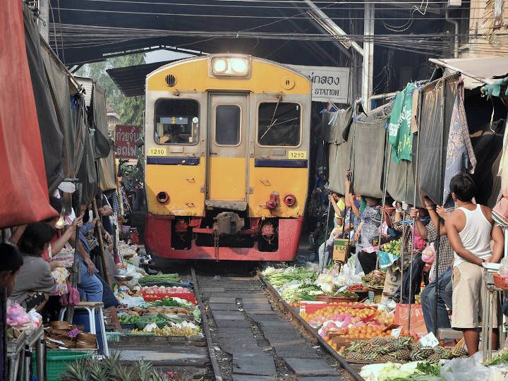 The market giving its way to the train @Train Umbrella Market